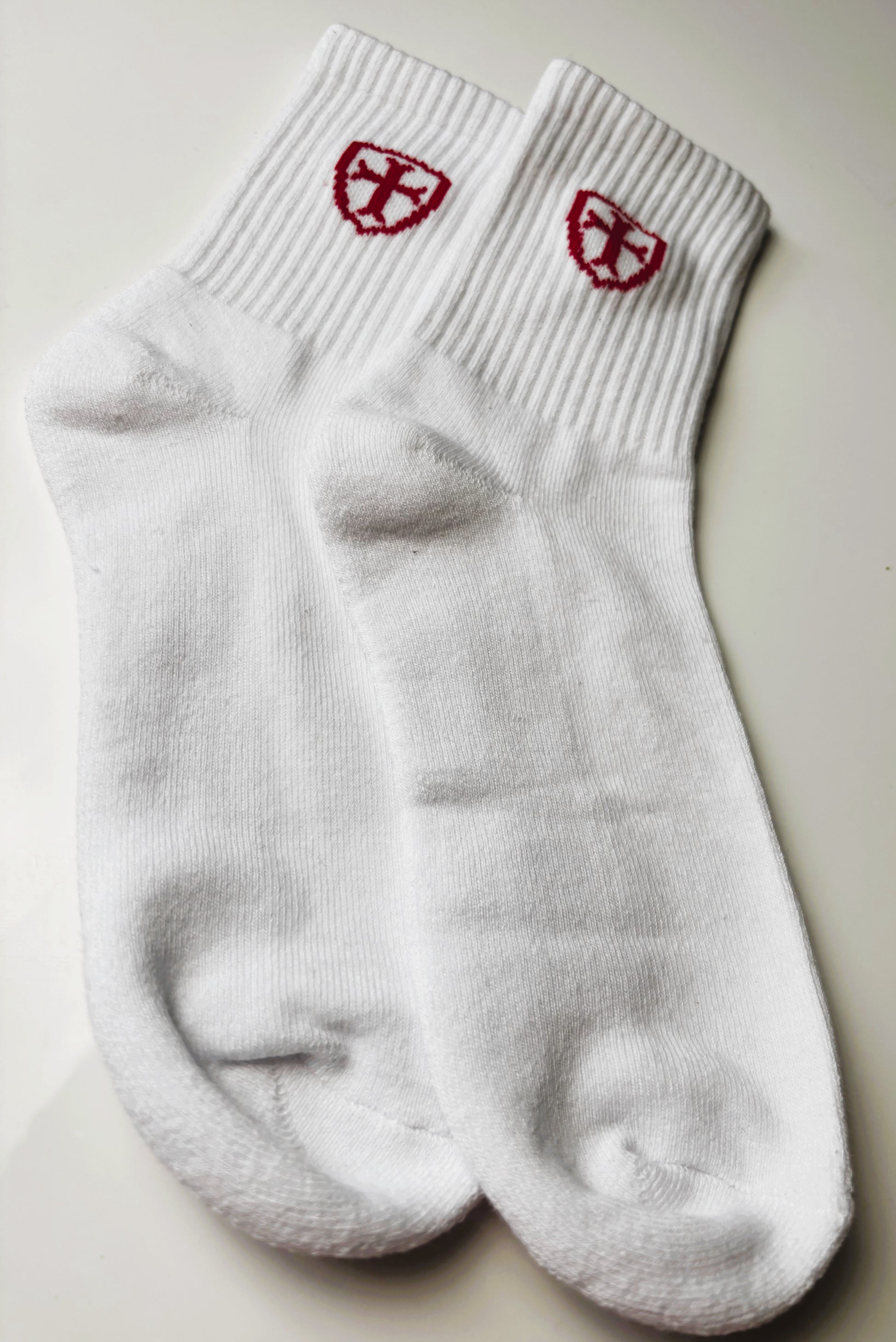 White cotton socks with red logos