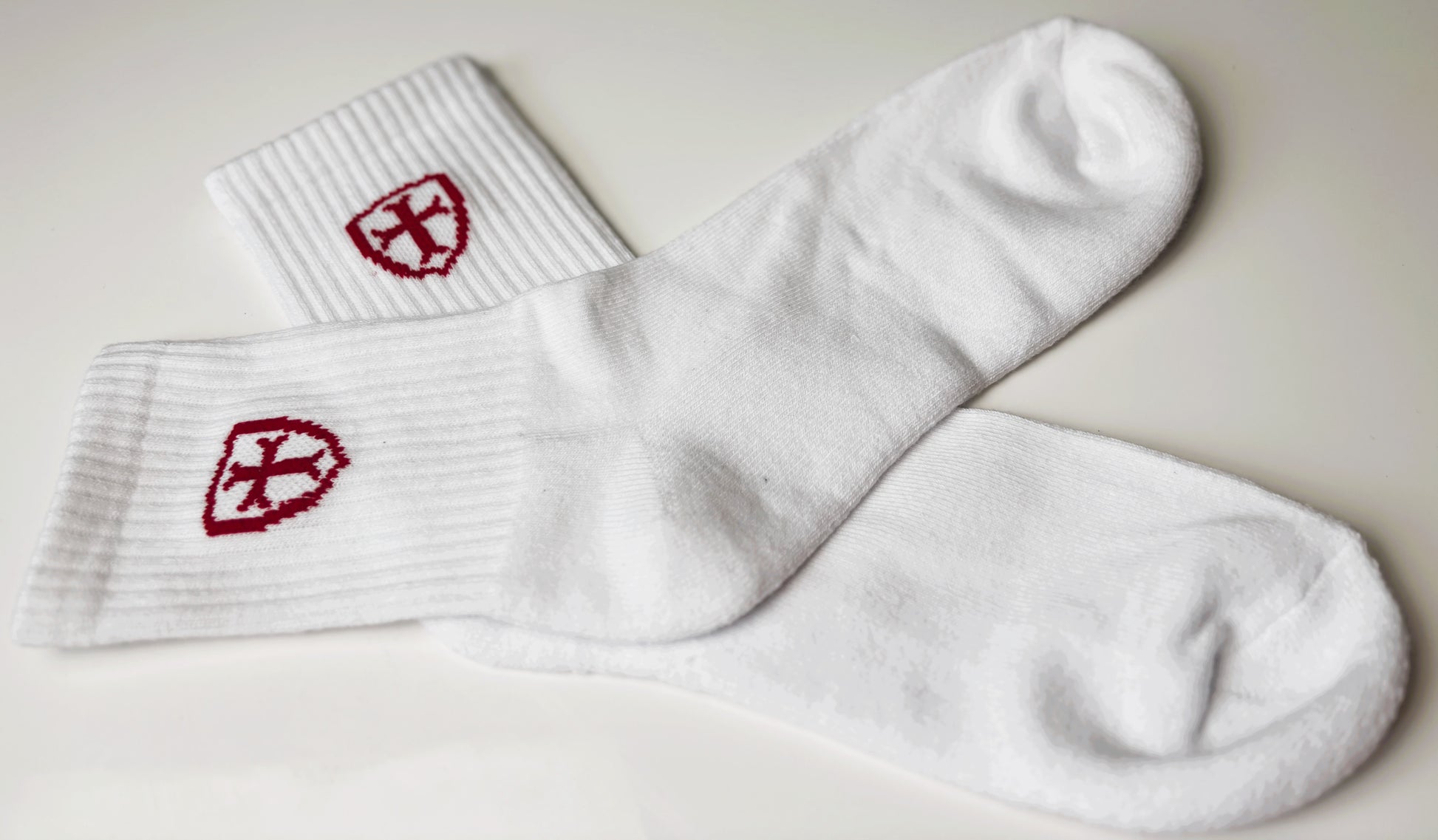 White cotton socks with red logos