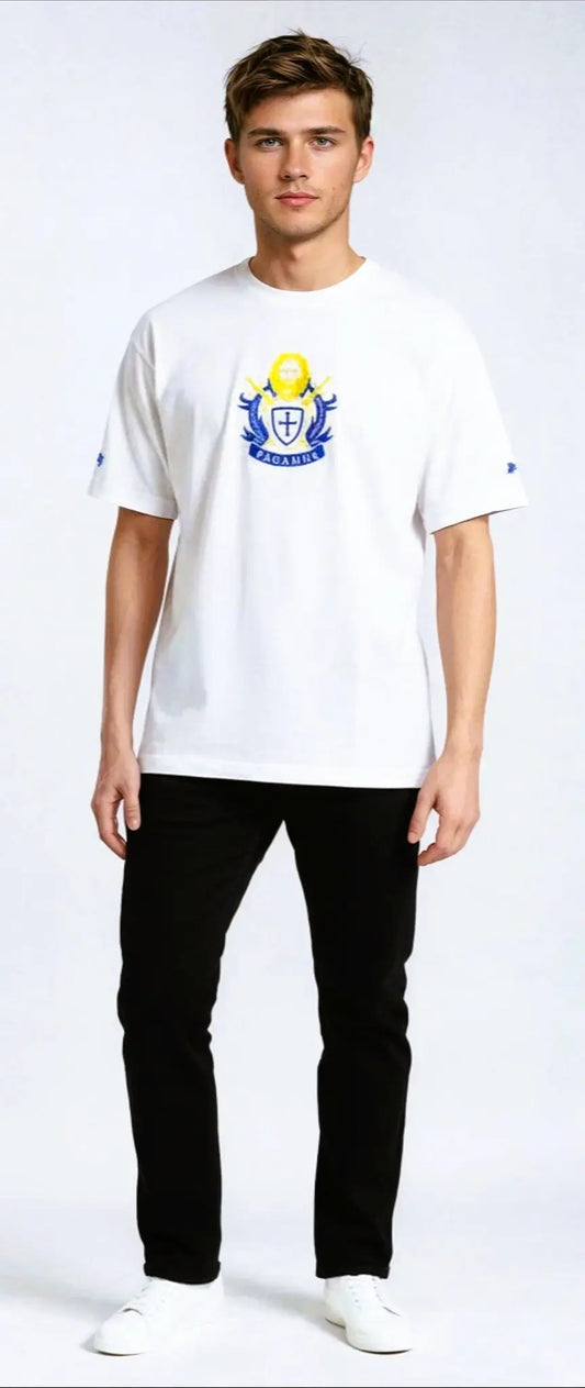 Person wearing a white Paganus t-shirt with a volumus nos patrium redire logo on a white background