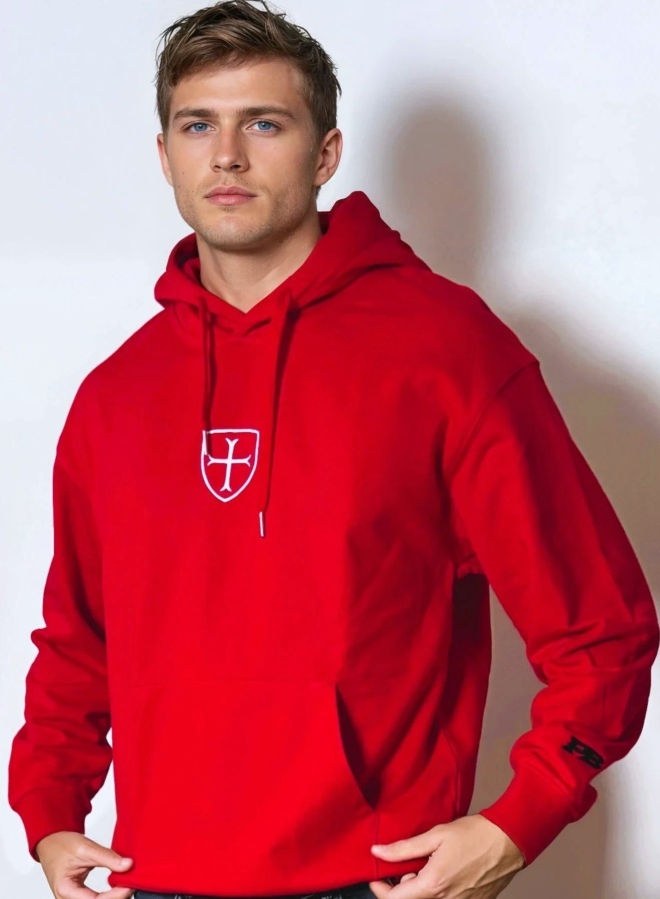 Paganus 400gsm cotton red hoodie with a white patriot shield logo