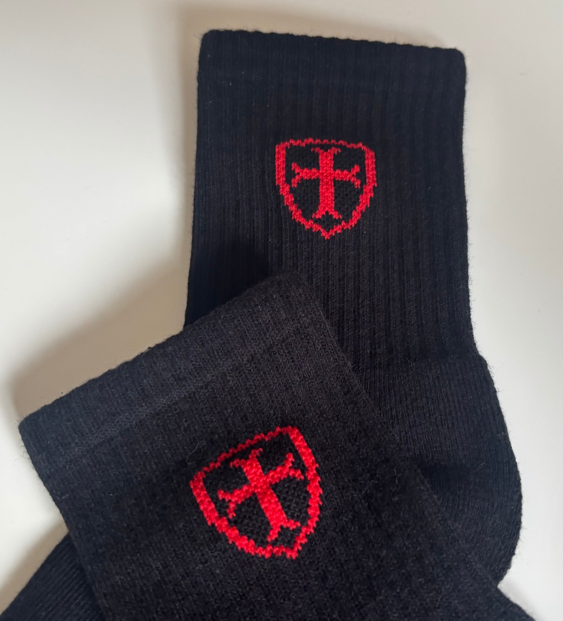 Black socks with red logo