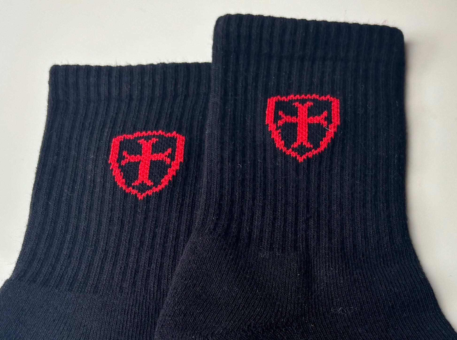 Black socks with red logo