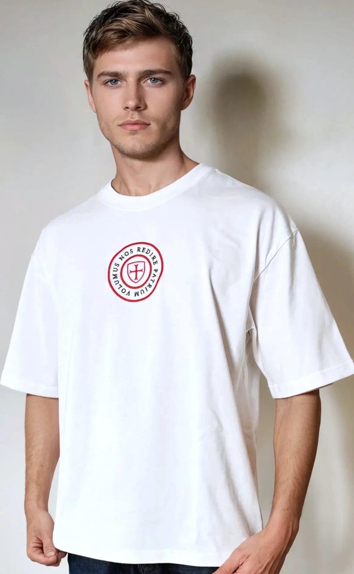 Paganus 280 gsm white t-shirt with a red logo. volumus nos patrium redire