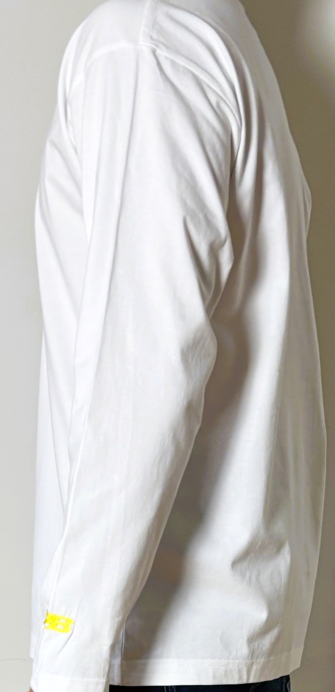 Long sleeve white 250gsm t-shirt with triple logos.