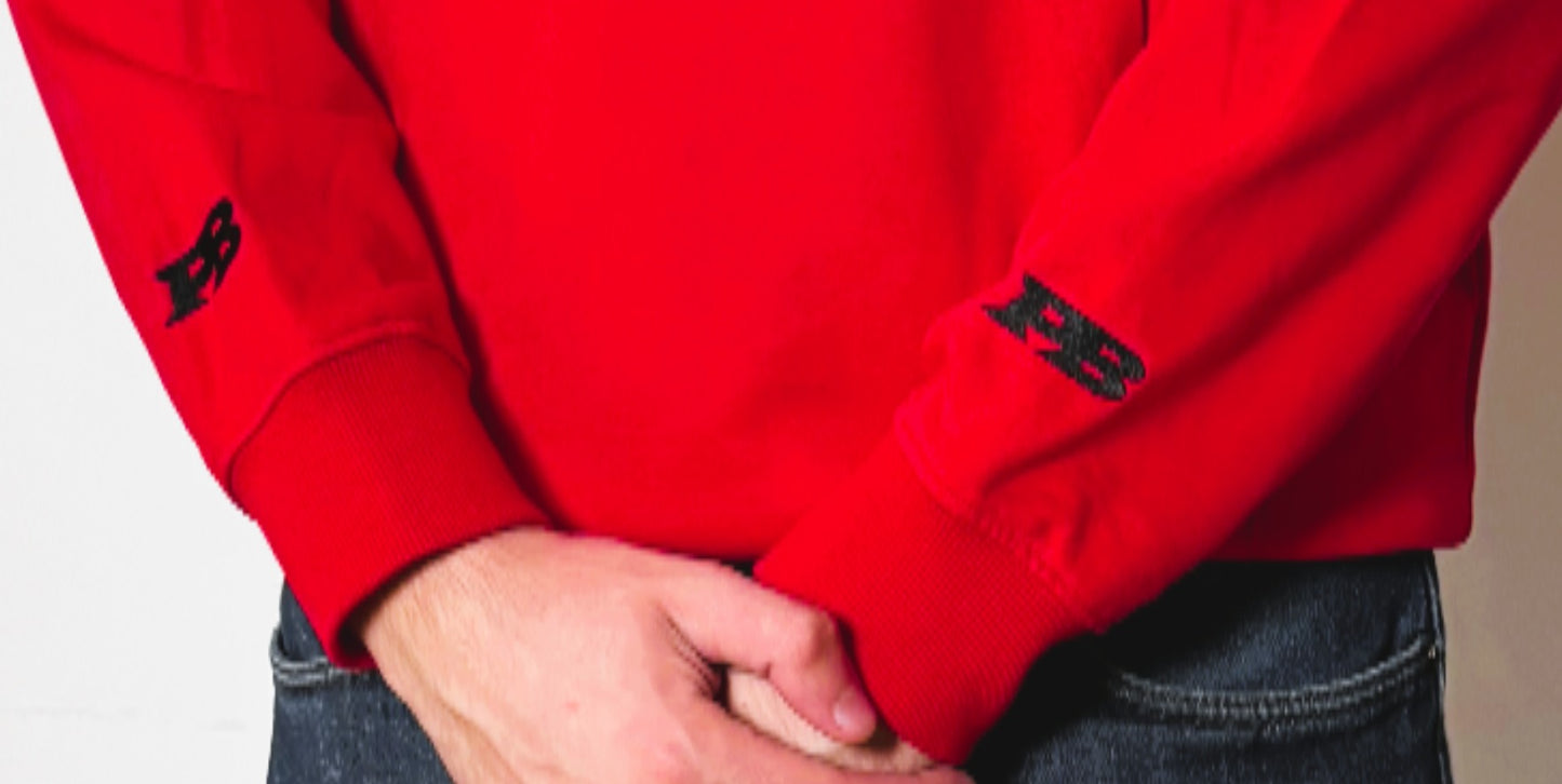 Red hoodie with a white logo