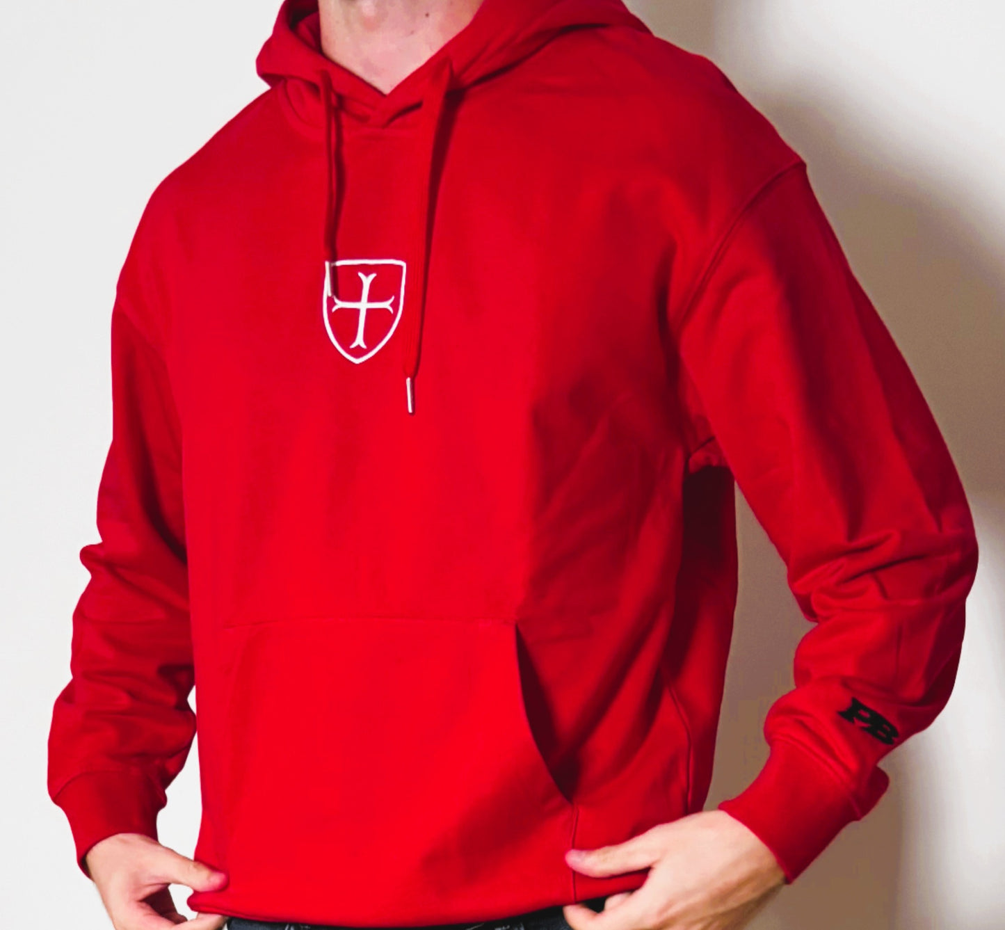 Manchester red hoody with triple logos.