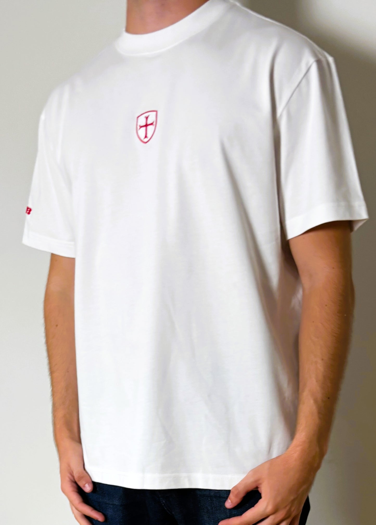 White heavy cotton t-shirt with a red patriot logo