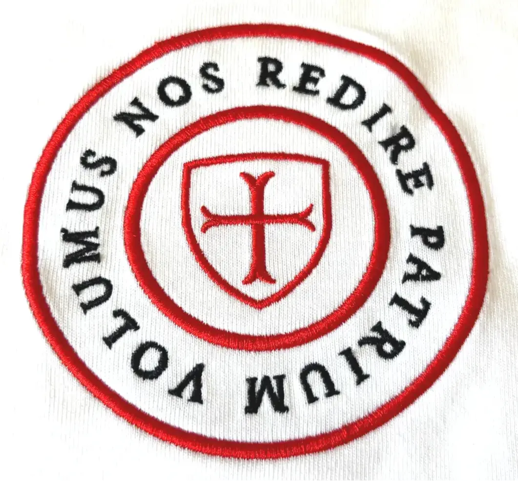 Paganus 280 gsm white t-shirt with a red logo. volumus nos patrium redire