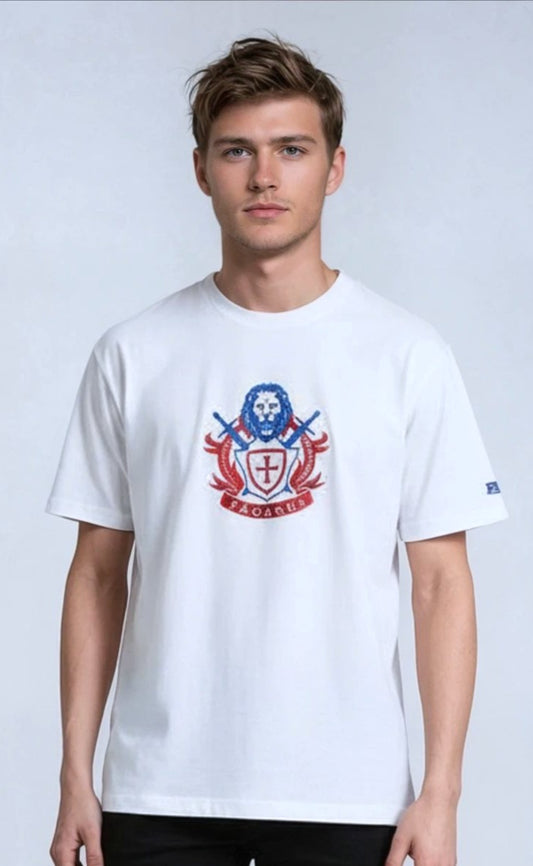 Man wearing a white paganus  t-shirt with a patriot logo