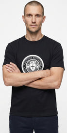 Man wearing a black PAGANUS BRITANNIA