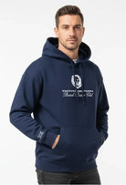 Man wearing a navy blue hoodie with a logo and text on a white background