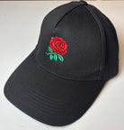 Black Paganus cap with a red English rose 