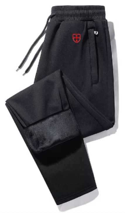 Black jogging pants with a red logo