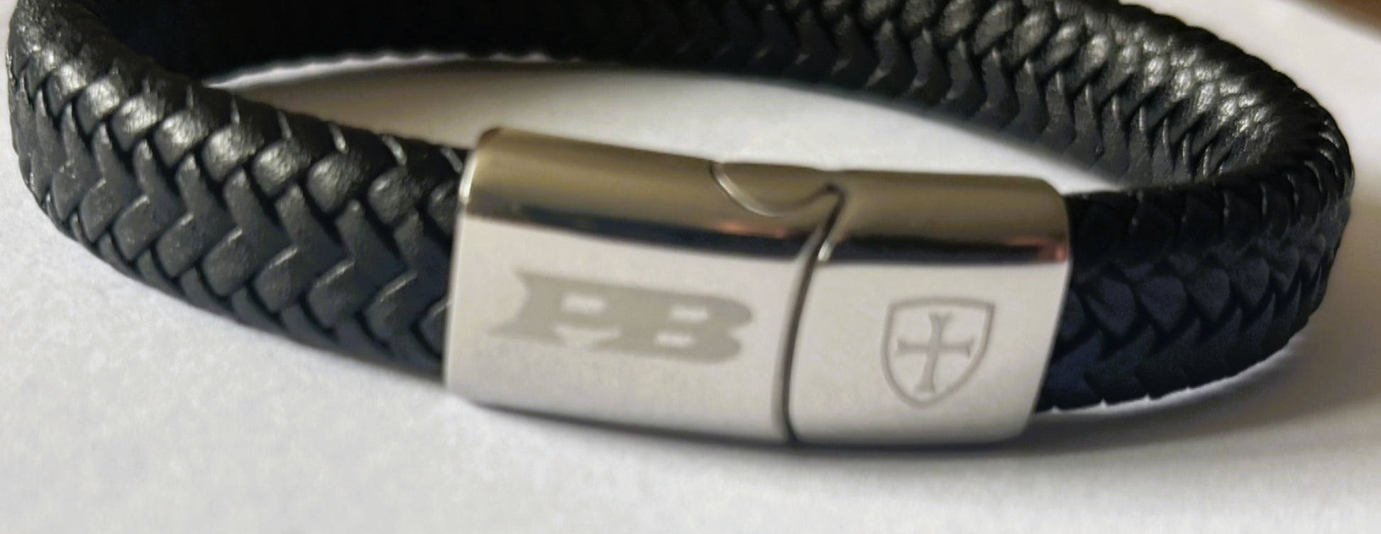 Black braided leather bracelet with a steel clasp 