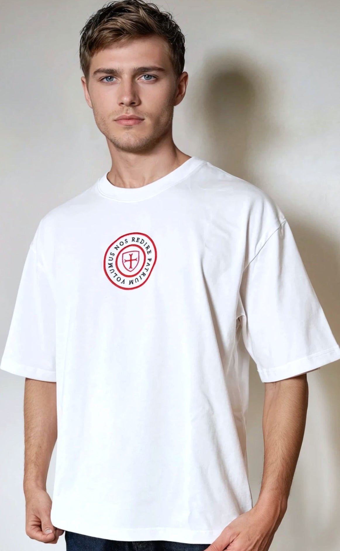 Paganus 280 gsm white t-shirt with a red logo. volumus nos patrium redire