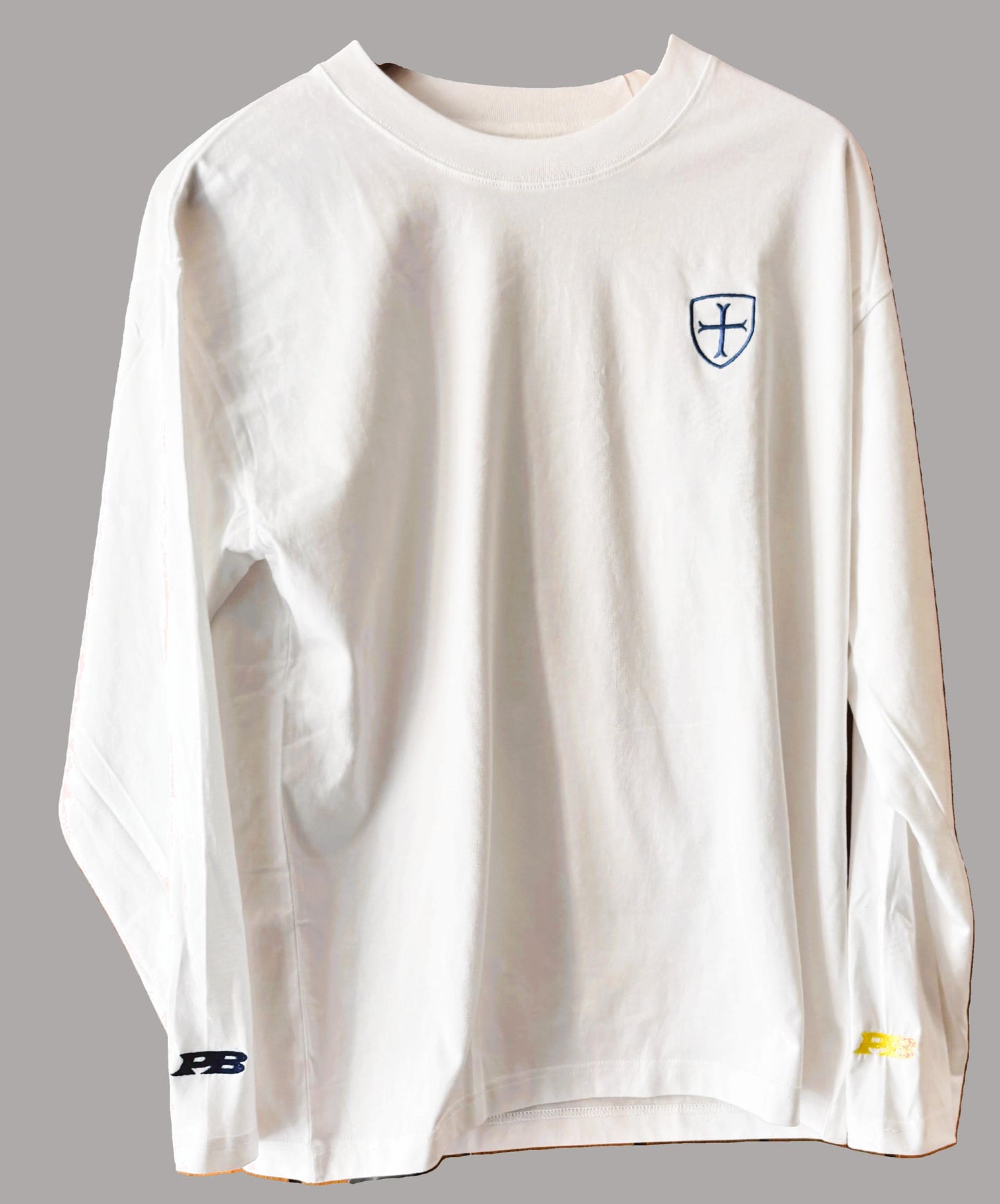 Long sleeve white 250gsm t-shirt with triple logos.