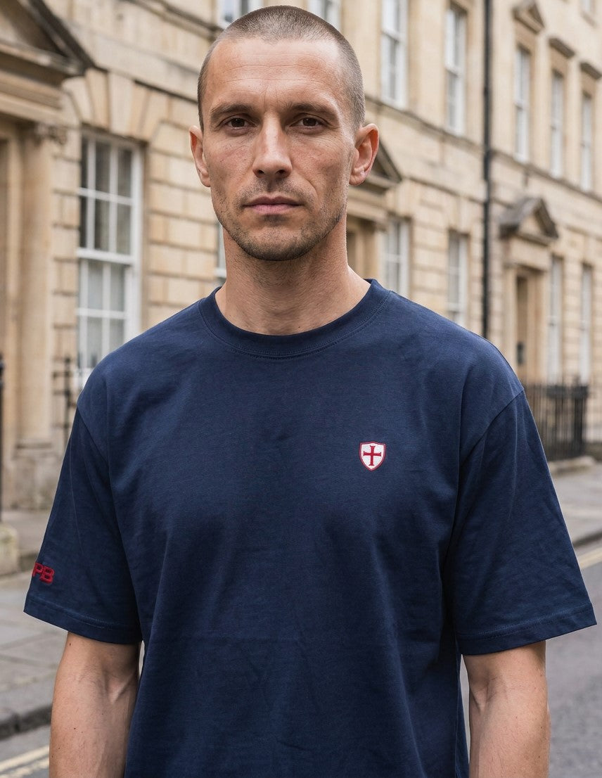Charity Shield t-shirt, £5 from every sale added to our Key Charities fund.  Navy Blue Shield t-shirt 280gsm luxury cotton Paganus Britannia