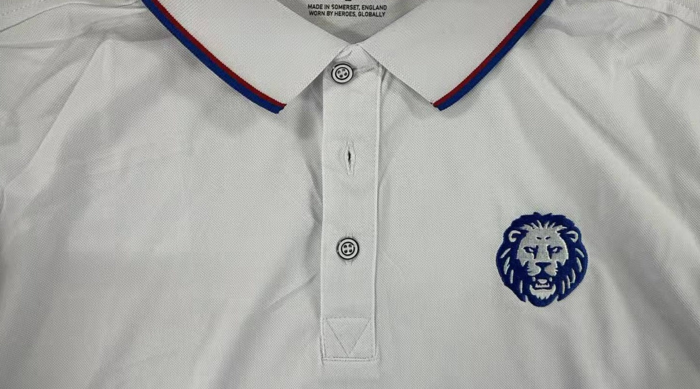 230 gsm white polo shirt with blue lion embroidery logo. Paganus Britannia