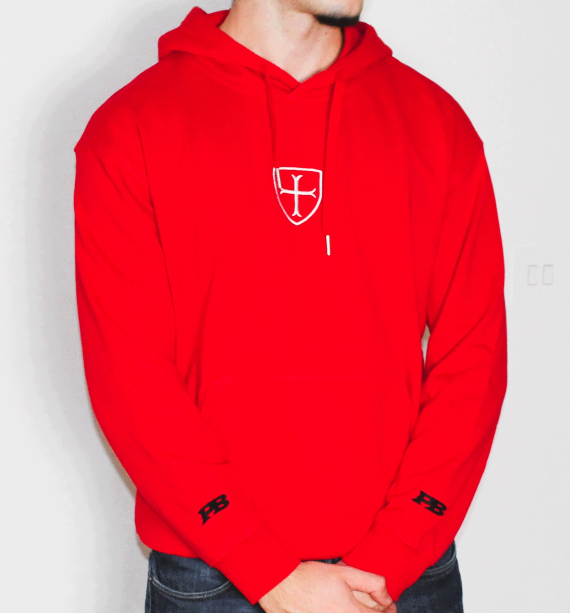 Red hoodie with a white logo 