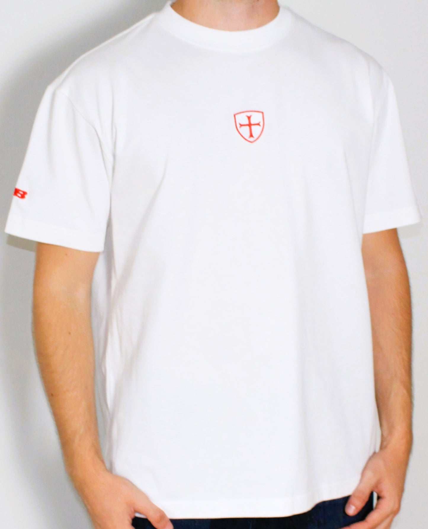 White heavy cotton t-shirt with a red patriot logo 