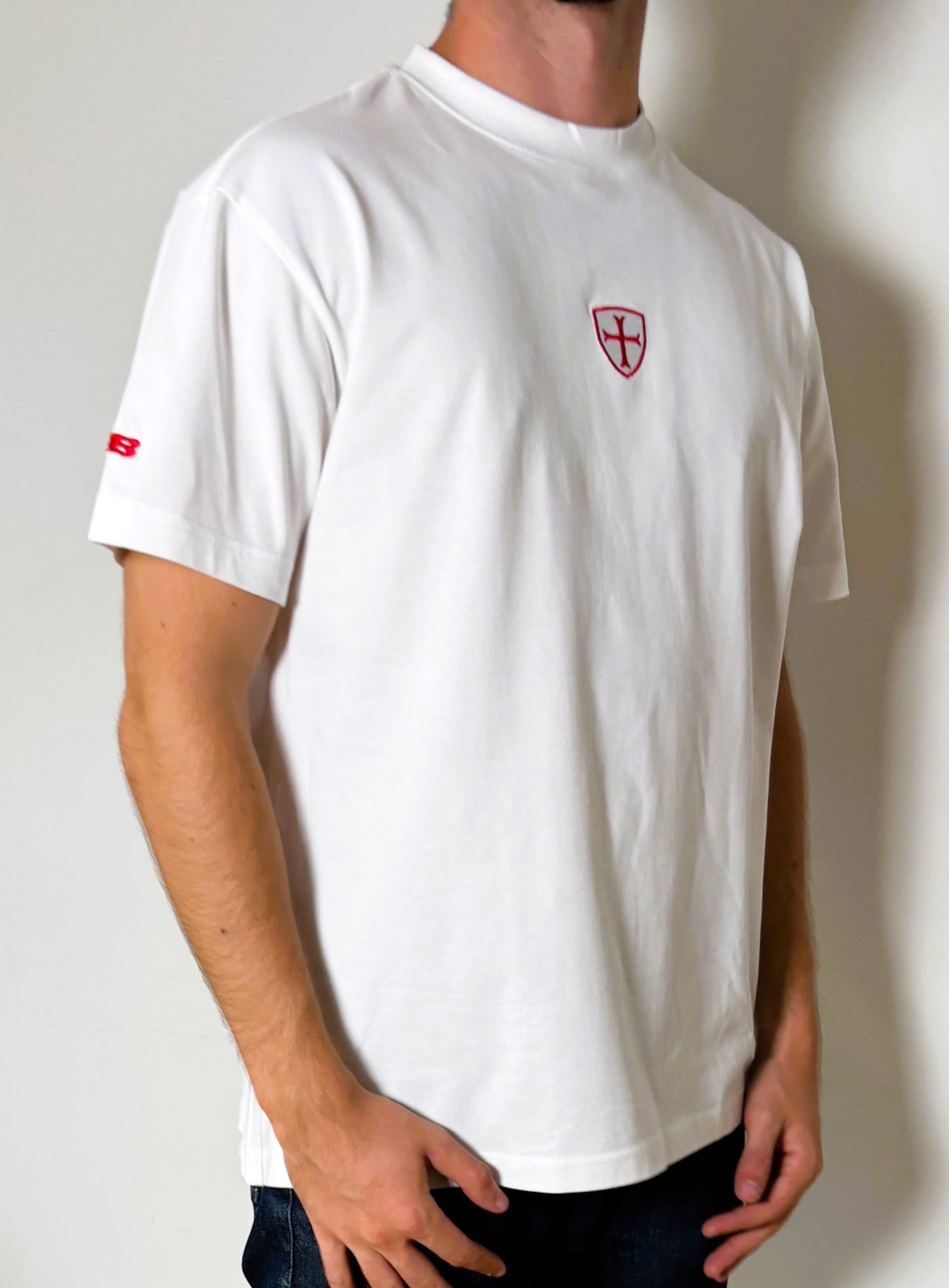 White heavy cotton t-shirt with a red patriot logo 