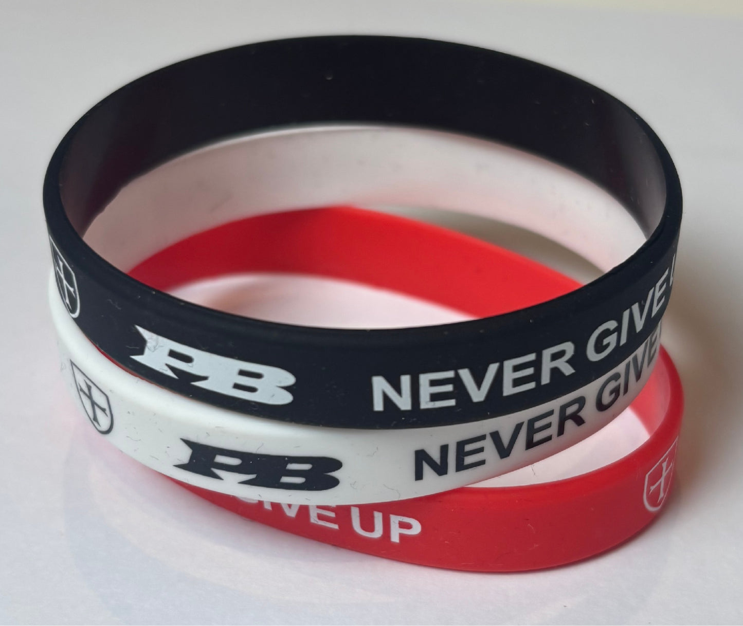 Red White & Black bracelet set. £3 from each sale donated to UK mental health charities.