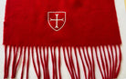 Red merino scarf with a white emblem on a white background
