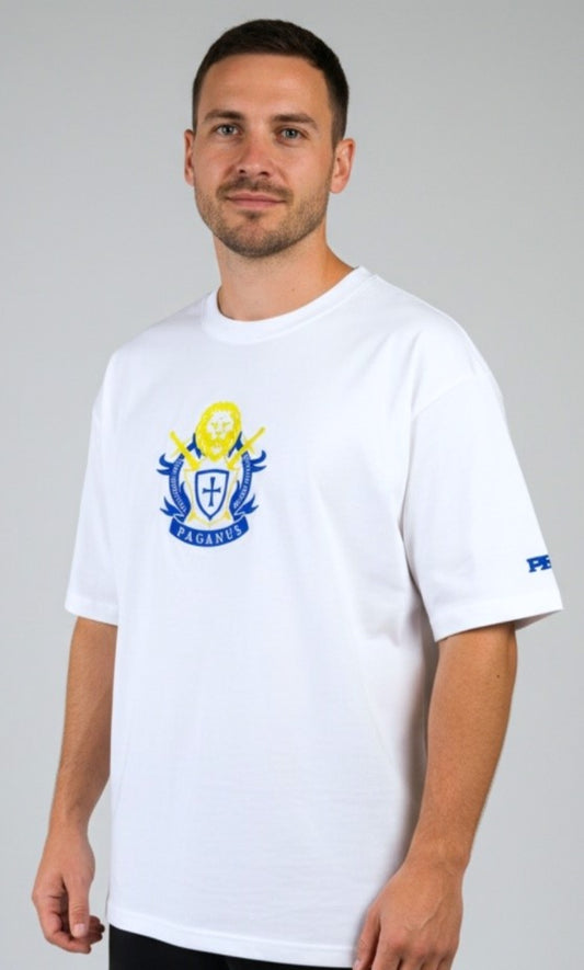 Person wearing a white Paganus t-shirt with a volumus nos patrium redire logo on a white background